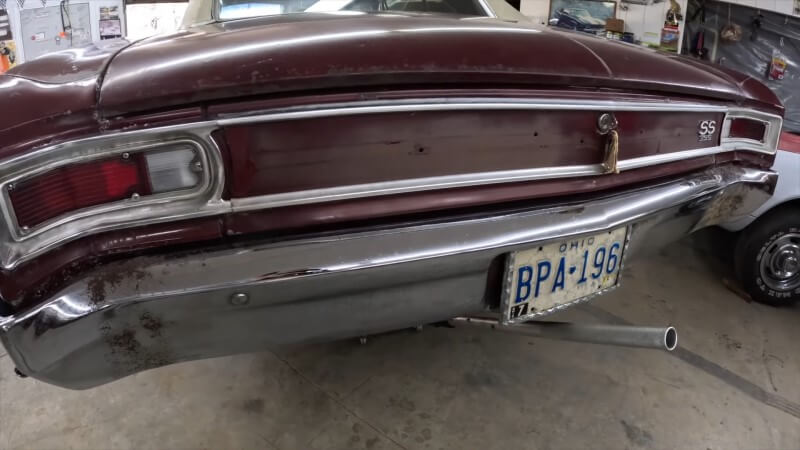 A wide angle shot of the rear end of a 1966 Chevelle Super Sport showcasing the tail pan